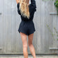 black ruffle shirt